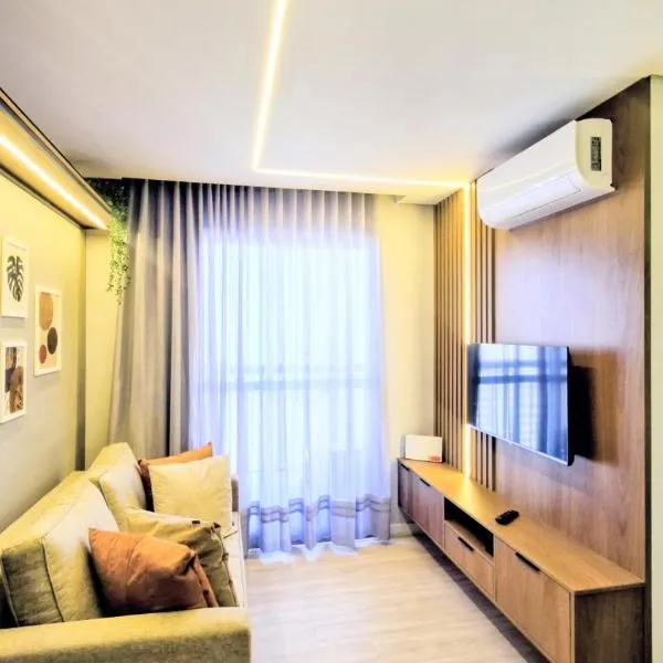 Apartamento 1402 com 2 quartos, sala, cozinha completa, garagem, lazer e portaria 24h，位于坎皮纳斯的酒店
