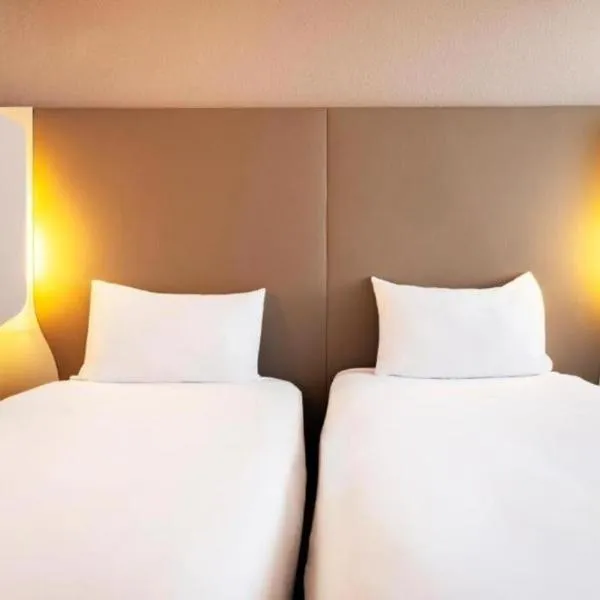 钟楼圣昆廷酒店，位于圣康坦的酒店