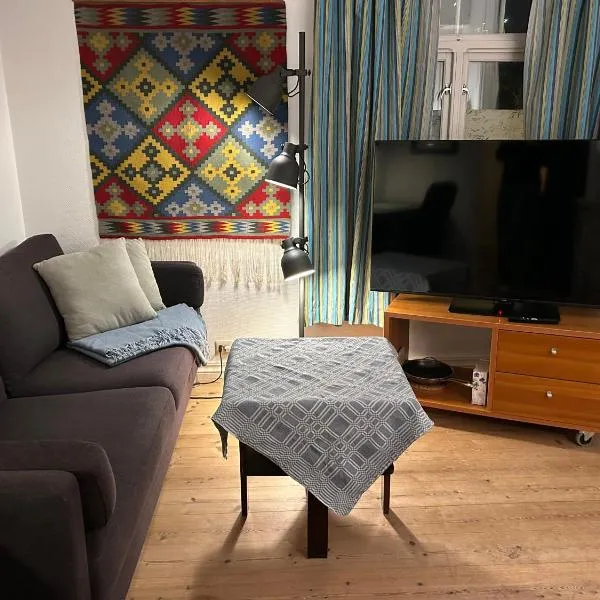 Sentralt og koselig，位于克里斯蒂安桑的酒店