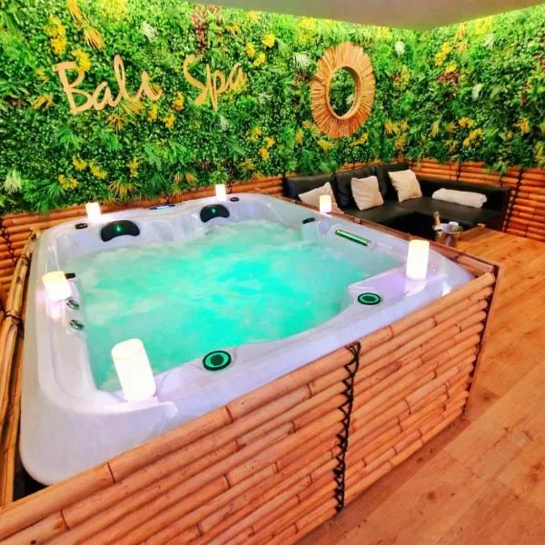 BALI SPA-4 Pers-Jacuzzi-Parking-Jardin-Clim-Colmar，位于Muntzenheim的酒店