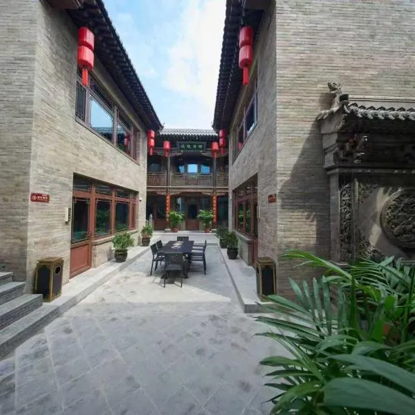 红灯笼会馆南大街店,位于平遥的酒店