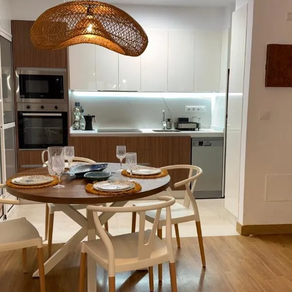 Piso con AC, piscina y pista de pádel y tenis en Águilas，位于阿桂拉斯的酒店
