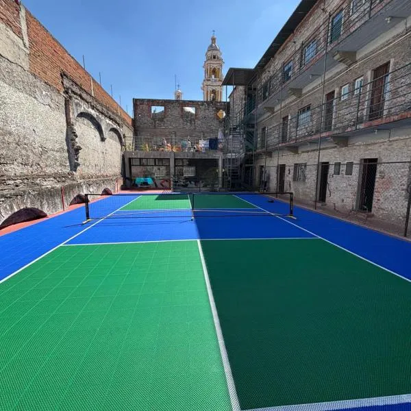 Hostal Casa De Arcos，位于普埃布拉的酒店