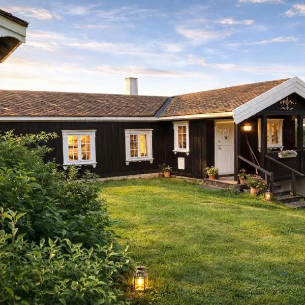 Smie på sjarmerende og historisk gård，位于Baukål的酒店