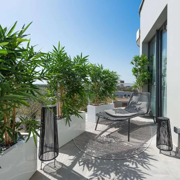 GOLDEN TULIP LYON OUEST TECHLID Hotel & Spa，位于利莫内的酒店