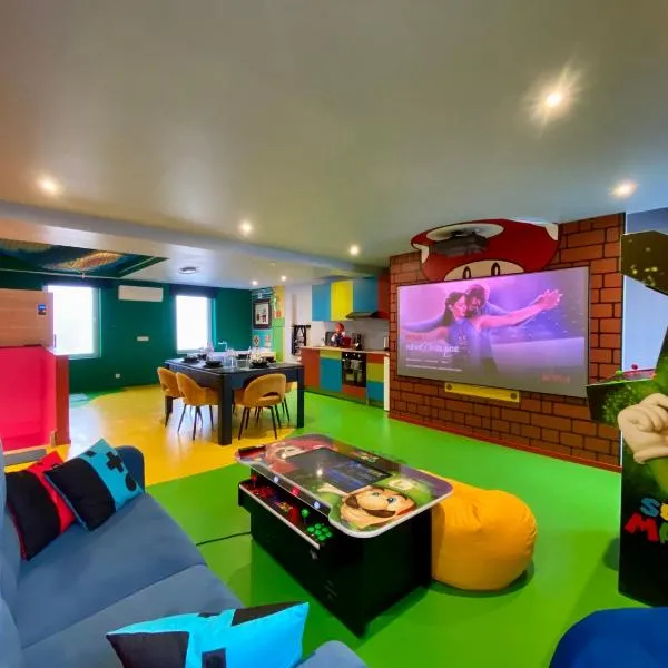 Retro Gaming Corner - Arcade Games - Jacuzzi - Sauna - Switch 2，位于Courcelles的酒店