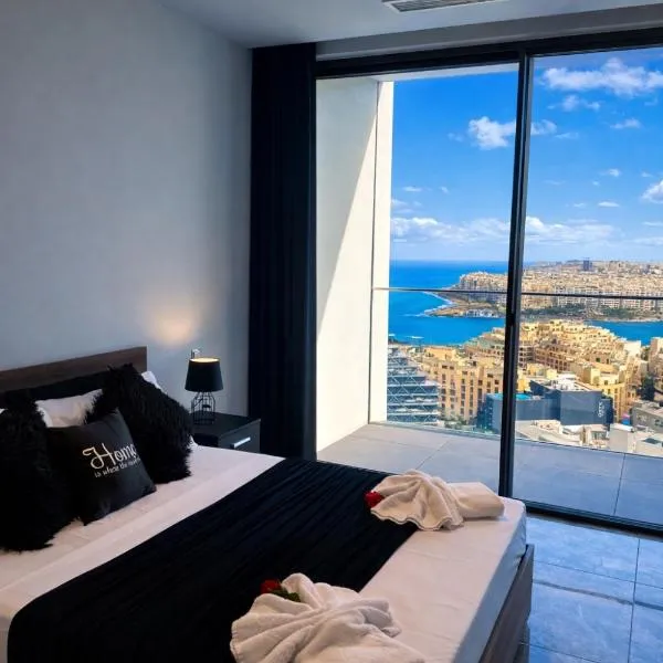 Whispering Waves at Mercury Tower with panoramic view , 2X pools and Gym，位于帕切维拉的酒店