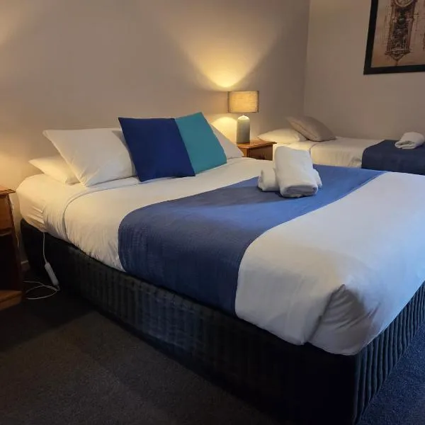 曼斯菲尔德旅客山林小屋汽车旅馆，位于曼斯菲尔德的酒店