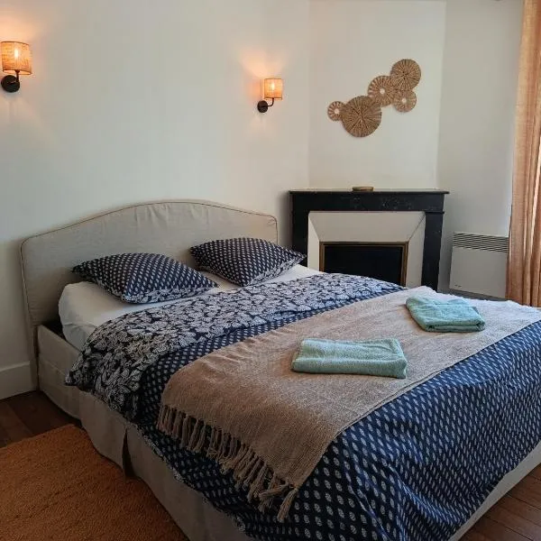 Appartement Refait a neuf avec accès au jardin , local vélo et Wifi，位于La Machine的酒店