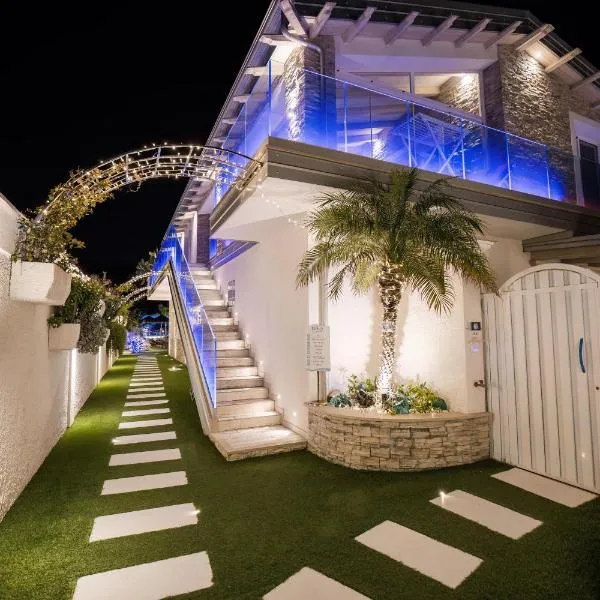 Étoiles Luxury Resort & Apartment- Fronte Mare，位于帕尔米的酒店
