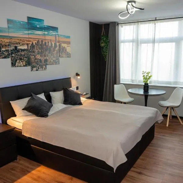 Stilvolles Apartment nähe Mainz mit Parkplatz，位于Ober-Olm的酒店