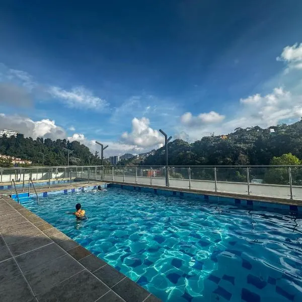 Apartamento moderno con parqueadero gimnasio piscina climatizada y coworking - Ubicación ideal cerca al cable，位于马尼萨莱斯的酒店