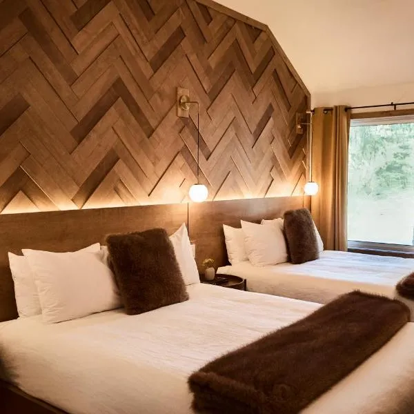 Motel Boutique Hygge - anciennement Aux Portes du Soleil，位于拜圣保罗的酒店