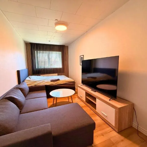 Cozy Room in the heart of Rødby! 5km from Femern & Puttgarden!，位于勒兹比的酒店