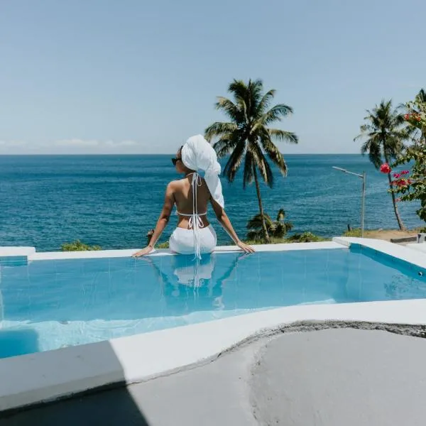 宾塔纳萨帕拉索别墅，位于曼巴豪的酒店