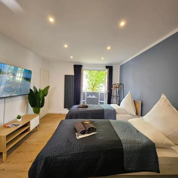 Modern Homes - Voll ausgestatte Wohnung - Balkon - Hotelbetten - 4K TV - WLAN，位于莫尔斯的酒店