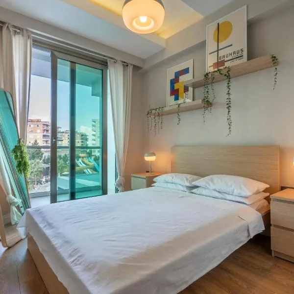 Sirius Town Apartment with Pool, Beach Access, Spa & Gym Near Mall，位于Aksu的酒店