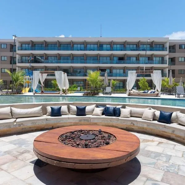 Malia Beach Experience, Flat 105A em Porto de Galinhas, Muro Alto-PE，位于伊波茹卡的酒店