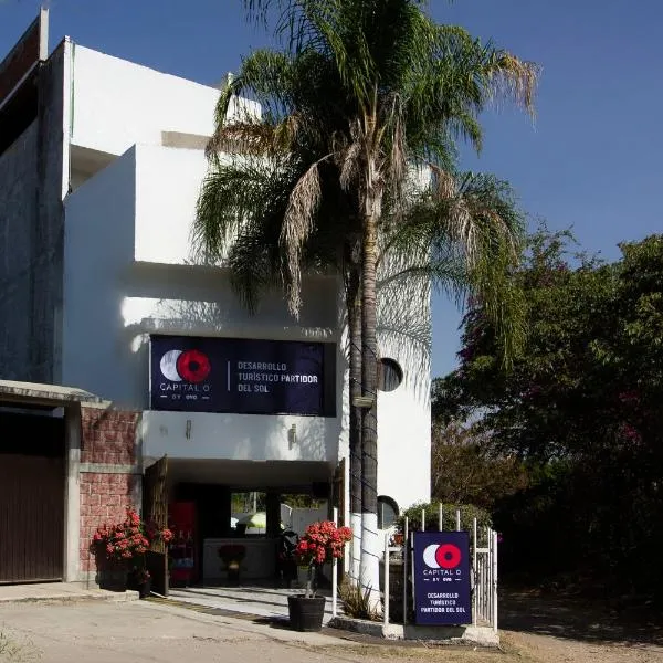 Capital O Hotel Partidor Del Sol，位于瓦兹特佩克的酒店