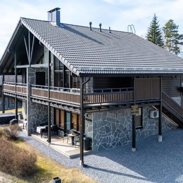 Himos Mökki superior - Chalet Cottage superior ski-in-ski-out，位于耶姆赛的酒店