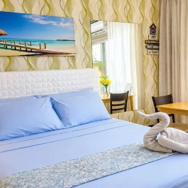 Stay & Fly at Amani Grand Resort Residences 3 Guests 5-Min Airport Pool Fast WiFi Netflix，位于麦克坦的酒店