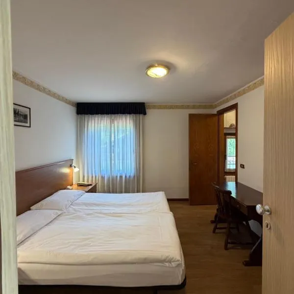 Single Rooms，位于塔尔维西奥的酒店