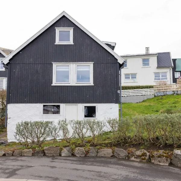 Traditional Faroese House Near Airport，位于瑟沃格的酒店
