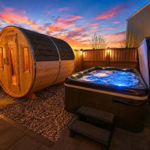 Urban Utopia - Hot Tub - Sauna - BBQ - Firetable - Garage - AC，位于埃德蒙顿的酒店