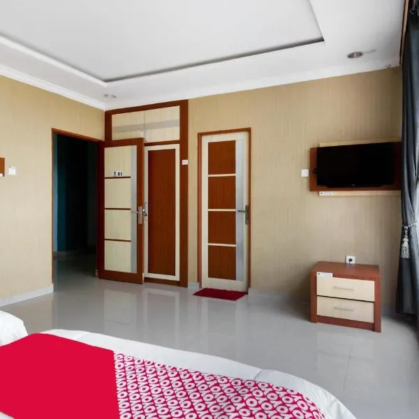 Collection O 3431 Hotel Alpha Bandara，位于巨港的酒店