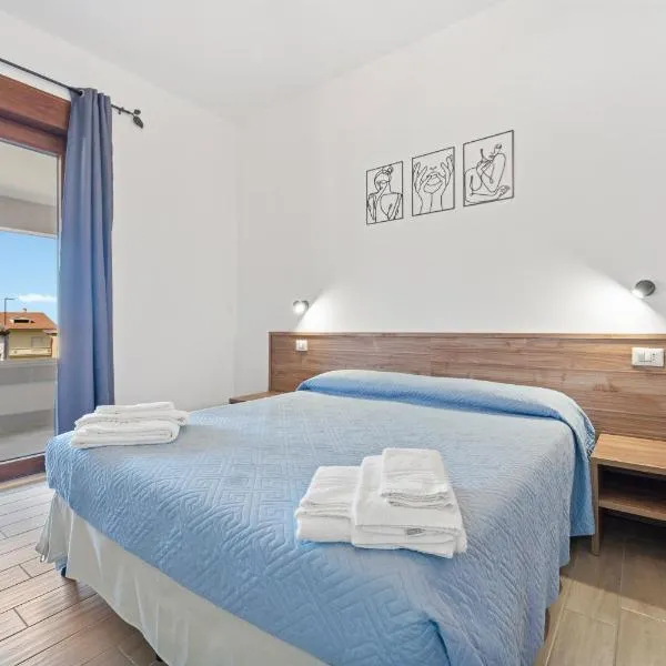 CLASS ROOMS AFFITTACAMERE con bagno privato , vicino alle DUNE di PORTO PINO，位于圣阿纳阿雷西的酒店