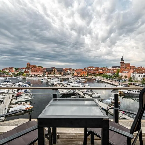 Wohlfühloase in der Hafenresidenz mit Balkon und Wellness，位于瓦伦的酒店