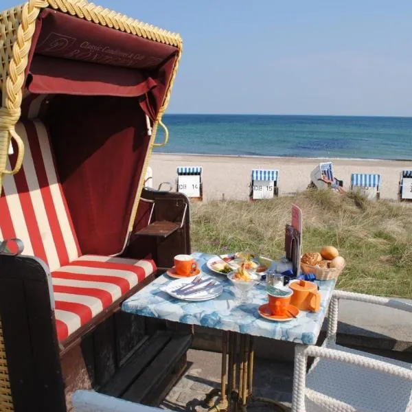 Fewo Schwalbennest am Meer-exklusiv-eigener Strandzugang，位于奥斯赛拜-屈隆斯博恩的酒店