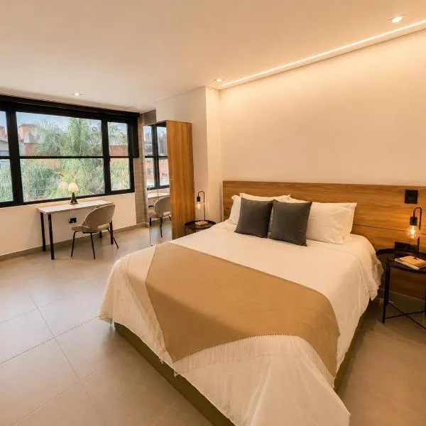Once Suites，位于恩维加多的酒店