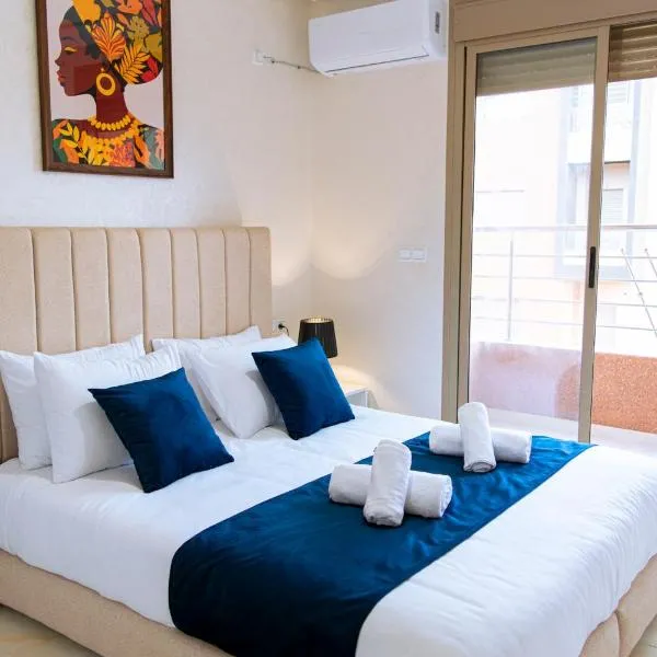 Elegant Apartment with Mountain Views，位于贝尼迈拉勒的酒店