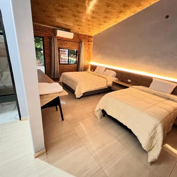 Hotel Suites Bambú，位于Minga Guazú的酒店