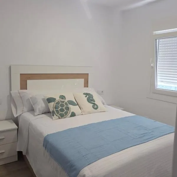 Apartamento con vistas a la playa en Laxe,位于拉赫的酒店
