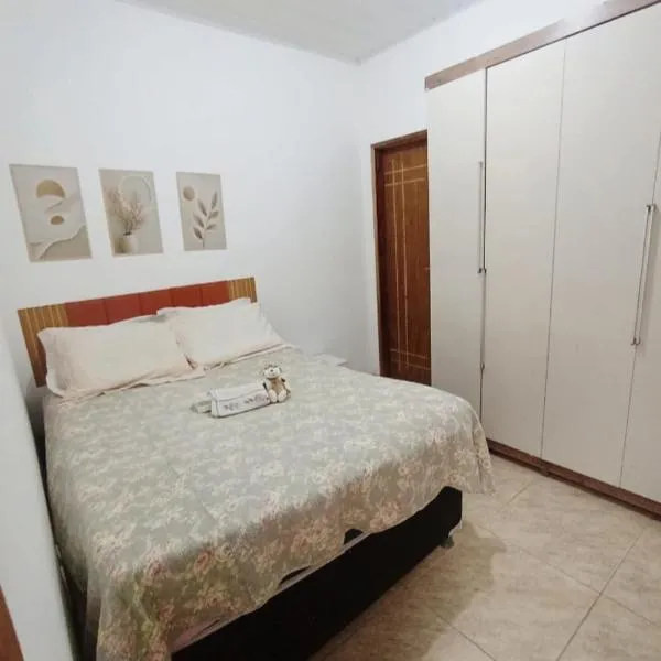 Aluguel de quarto com suite，位于阿拉卡茹的酒店