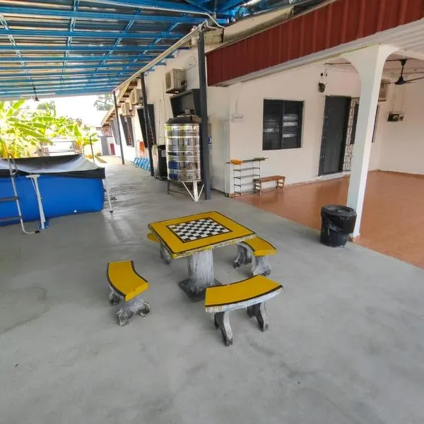Homestay Opah, Parit Buntar, Perak，位于巴力文打的酒店