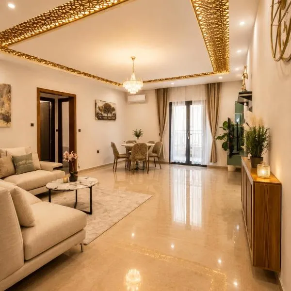 Charming 2-Bedroom Apartment with Garden View Balcony，位于哈马马特的酒店