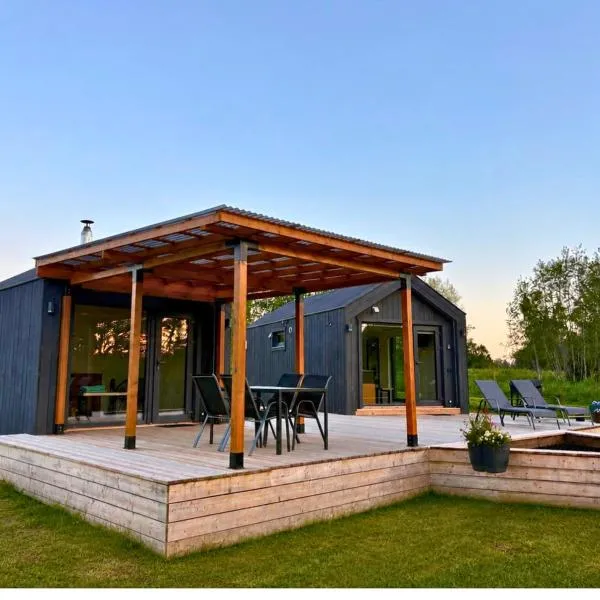 Rātes Krasti - Rasa - holiday house with sauna and lakeview，位于Lejasciems的酒店