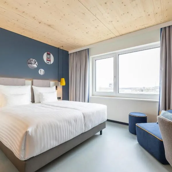Leonardo Smart Hotel Vienna Airport，位于施韦夏特的酒店