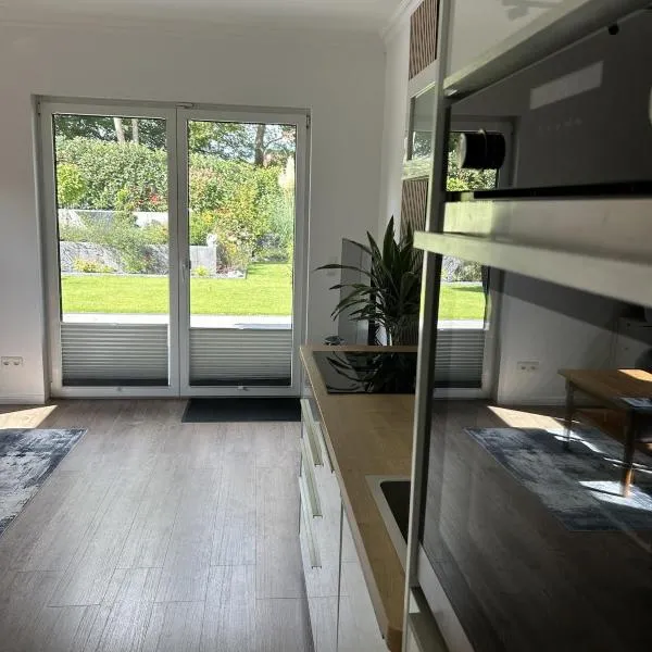 Moderne 1-Zimmer-Gästewohnung im Neubau mit schönem Garten,位于Pronstorf的酒店