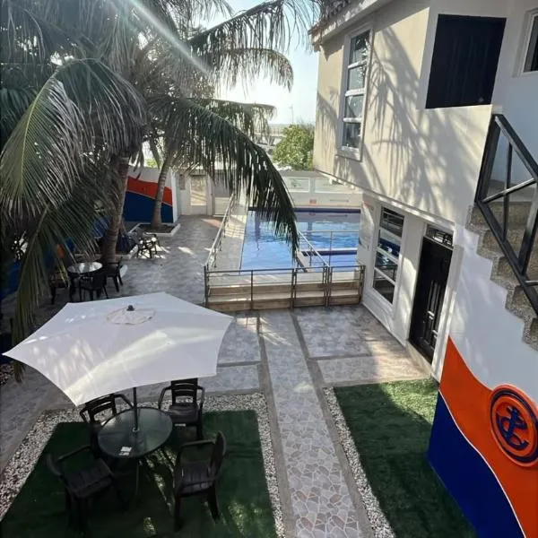 Hotel El Emigrante，位于哥伦比亚港的酒店