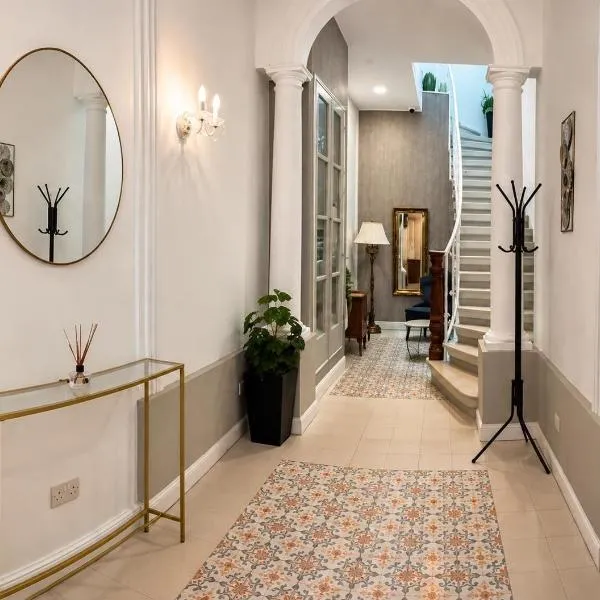 Maltese Terrace house with a modern touch - close to airport 4 km，位于Tarxien的酒店