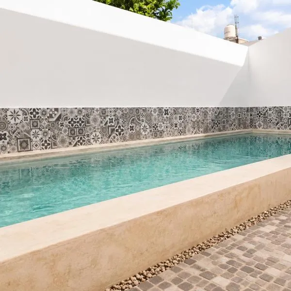 Casa Completa con Piscina Privada 10 min Aeropuerto Ideal para Familias y viajeros，位于梅里达的酒店