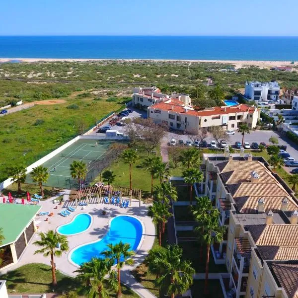 Praia da Lota Resort – Beachfront Apartments，位于Nora的酒店
